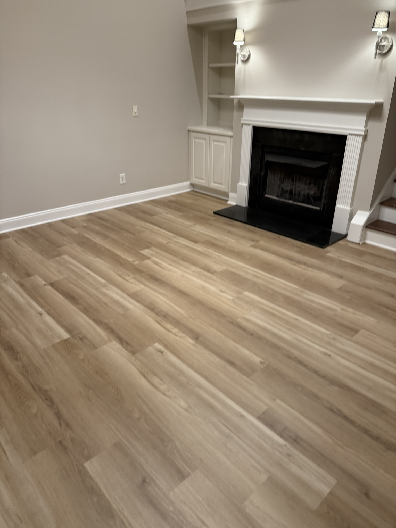 Flooring Completed - Living Room with Fireplace